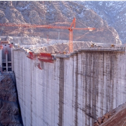 How is a dam constructed?