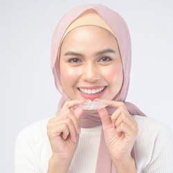 The Road to a Perfect Smile: Invisalign Aligners vs. Invisible Braces