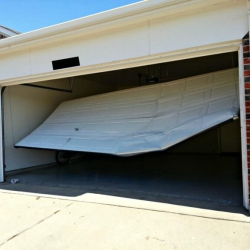 How to Fix a Bent Garage Door: A Comprehensive Guide